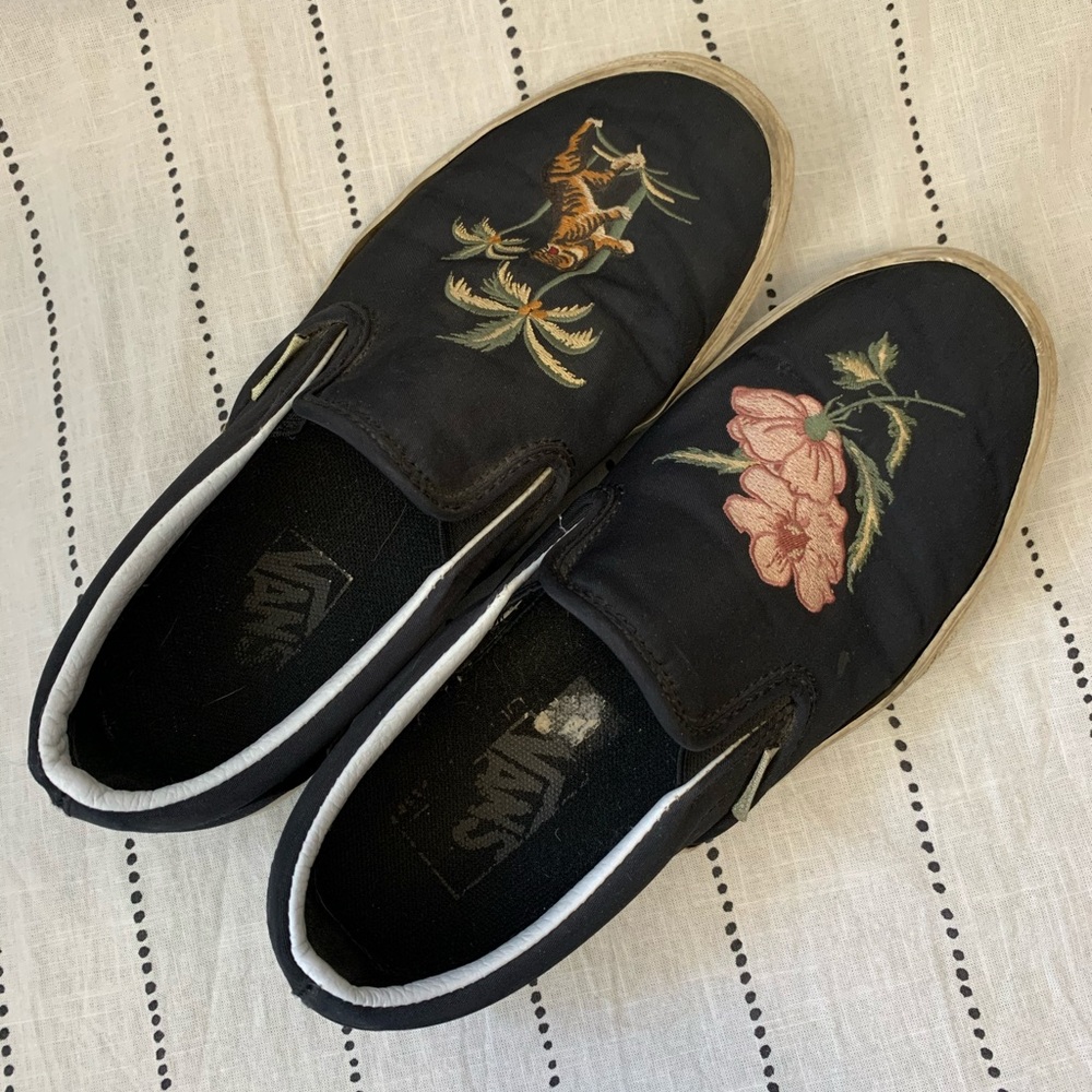 Black Vans slip ons